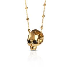 Geometric vampire skull pendant in 18 carat gold vermeil with black onyx eyes and fanged teeth. Kasun pieces are often playful, sometimes quirky, and always beautiful. Made in Thailand 18ct yellow gold plated sterling silver Gold Skull Necklace For Halloween, Yellow Gold Skull Jewelry For Gift, Luxury Skull Jewelry For Gifts, Halloween Skull Shaped Gold Jewelry, Luxury Skull Shaped Jewelry For Gift, Gold Skull Jewelry For Party, Gothic Gold Jewelry For Formal Occasions, Gold Gothic Jewelry For Formal Occasions, Fanged Teeth