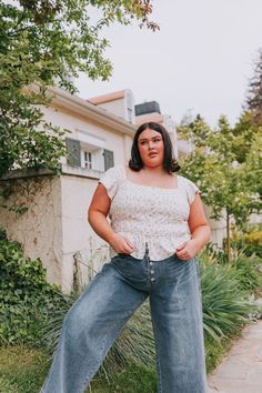 Unleash your playful side with our PLUS SIZE Floral Frill Top! This button-down top features a square neckline and ruffle cap sleeves for a fun and flirty look. Perfect for adding a touch of quirkiness to any outfit. Details Button-down Square neckline Ruffle cap sleeve Sizing Approximate measurements: SIZE LENGTH BUST 1XL 23" 42" 2XL 25" 48" 3XL 25" 50" Fabric has no stretch - smocking allows for stretch*Model is 5'8" wearing a size 2XL Material Self 100% CottonLining 100% PolyesterHand wash co Frill Top, Frill Tops, Square Necklines, Outfit Details, Square Neckline, Cap Sleeve, No Frills, Cap Sleeves, Smocking