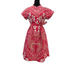 A beautiful red batik dresses on cheongsam neck and on flower and parang batik motifs.  ❤️ Flower is reflection of a beauty. ❤️ Parang is one of the classic batik motif.  Parang is symbolize of strength and unity. Size chart Bust 90cm Sleeves 14cm Length 95cm Traditional Red Ao Dai For Summer, Red Short Sleeve Dress With Batik Print, Red Fitted Dress With Batik Print, Fitted Red Dress With Batik Print, Traditional Ao Dai With Floral Print, Red Cheongsam, Batik Dress, Cheongsam, Dress Clothes For Women