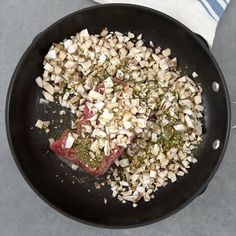 a pan filled with food on top of a table