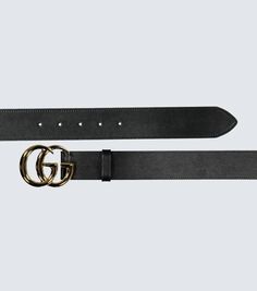 Crafted in Italy from leather, this black belt from Gucci features the label's double G buckle logo in gold, this style comes with punch holes for an adjustable fit..Color of fastening: gold.Made in Italy.Material: calf leather.Width 4cm-1.5' Black Leather Belt Buckle With Metal Logo, Designer Black Belt With Buckle, Designer Black Belts With Buckle Closure, Designer Black Belt With Buckle Closure, Business Leather Belt Buckles With Metal Logo, Leather Belt Buckles With Metal Logo For Business, Designer Black Belts With Metal Logo, Designer Black Belt With Metal Logo, Classic Black Belt With Metal Logo