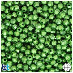 green glass beads with holes in the middle