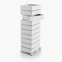 a tall white container sitting on top of a table