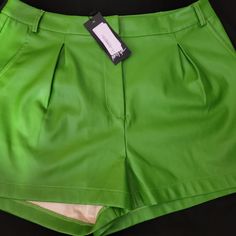 Womans Bright Green Polyester Shorts. Faux Leather Inside Has A Velvet Lining. Size 10. New With Tags. Green Shorts For Night Out, Casual Green Shorts For Party, Green Shorts For Spring Night Out, Green Shorts For Night Out In Spring, Green Short Bottoms For Night Out, Chic Green Shorts For Party, Bright Green, Size 10, Faux Leather