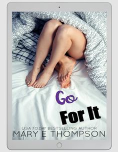 a woman laying in bed under a blanket with the words go for it