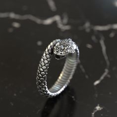 Snake ring, Serpent ring, vintage ring, dainty ring, wrap ring, thin ring, dainty ring, gold ring, silver ring, engraved ring, Norse Ring 💔Introducing our delicate Dainty Snake Ring, featuring a charming Hognose Snake design in silver. This elegant piece of jewelry is perfect for animal lovers and makes an ideal gift for her. Handmade with care, this silver ring exudes craftsmanship and attention to detail, ensuring a unique and personalized touch. Whether you're looking for a gift for a loved Norse Ring, Hognose Snake, Ring Wrap, Serpent Ring, Engraved Ring, Snake Design, Wrap Ring, Snake Ring, Ring Dainty