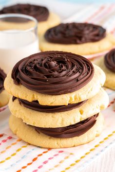 cookies with chocolate frosting stacked on top of each other