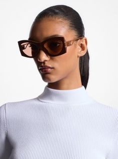 Our Navarra sunglasses give new meaning to eye-catching style. Designed in an oversized rectangular silhouette, this ultra-modern style features faceted “MK” detailing on the arms added drama. Michael Kors Trendy Polarized Sunglasses, Modern Black Michael Kors Sunglasses, Luxury Michael Kors Polarized Sunglasses, Luxury Classic Michael Kors Sunglasses, Michael Kors Luxury Modern Sunglasses, Michael Kors Collection, Ultra Modern, Colby, How To Take Photos