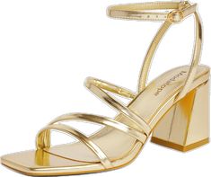 a gold high heeled sandal with straps