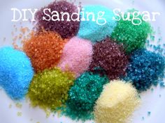 colorful sugar sprinkles on a plate with the words diy sanding sugar