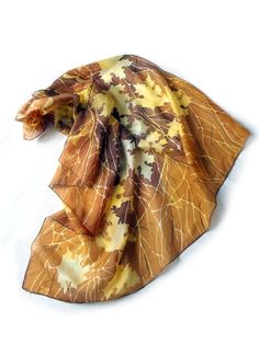 Big scarf Autumn Leaves is a square scarf made of Habotai Light in brown and yellow - gold colors. This hand painted silk scarf is covered in golden autumn leaves and branches on a warm brown background. Size: approximately 35 by 35 in (90 by 90 cm). Would you like to order it in oblong shape? How about 63 by 17 inches scarf: https://www.etsy.com/minkulul/listing/241652496 Silk: natural Habotai Light, which has lovely glow and partly - transparent quality. It's very delicate scarf in yellow and Painted Silk Scarves, Batik Painting, Autumn Scarf, Silk Scarfs, Scarf Autumn, Leaf Scarf, Big Scarf, Brown Fall, Silk Scarf Painting