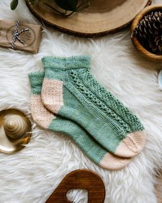 What is more resilient than a blade of meadow grass in spring? The softness of plants gives them the flexibility to be resilient to wind and changes. Inspired by plant life, this pattern is a gentle, breezy lace sock in three sizes, with mix and match options of foldover picot cuff, half twisted rib, and shortie or full length options. May you wear it with joy and explode in growth, ever growing in your softness and resilience in difficult times and in good times in the ever more challenging wor Lace Sock, Sock Knitting Pattern, Socks Photography, Be Resilient, Kids Garments, Sock Knitting Patterns, Lace Socks, Free Socks, Knit In The Round