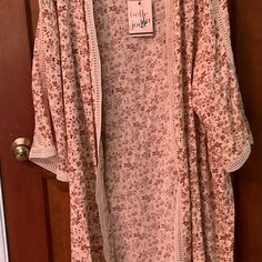 Size 1x Belle Du Jour, Light Weight, Beige With Light Brown Flowers, Edged In Beige Lace Down And Around 3/4 Sleeves, Bottom And Front. Never Worn. New With Tags. Spring Floral Print Outerwear For Loungewear, Beige Spring Cardigan For Loungewear, Beige Spring Cardigan For Daywear, Beige Cardigan For Spring Loungewear, Beige One Size Cardigan For Spring, Beige Cardigan For Spring Daywear, Beige Cardigan For Daywear In Spring, Spring Cotton Outerwear One Size, Cream One Size Summer Outerwear