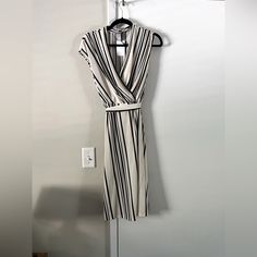 Creme And Black Striped Dress. Nwt!! Includes Removable Tie For Waist. Elegant Cream Dress By H&m, Chic H&m Midi Dress For Day Out, Elegant H&m Dress For Day Out, Fitted Beige H&m Dress, H&m Casual Cream Dress, H&m Knee-length Dress For Day Out, Casual Cream H&m Dress, Casual H&m Cream Dress, Elegant White Midi Dress By H&m