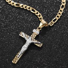 Take a moment to look at this marvelous pendant necklace handcrafted from gold plated 316L stainless steel. It showcases three-dimensional pendant in a figure of a Christian cross with one of a kind hollow diamond-shaped holes. It showcases a beautiful image of Jesus Christ in silver color. It is designed to be pressure and tough resistant by excellent professional jewelers and highly polished to achieve its desired durability.  Product highlights:   Delicately designed interlocking chain  Comfo Metal Crucifix Necklace As Gift, Gift Crucifix Necklace With Large Pendant, Crucifix Necklace With Large Pendant As Gift, Silver Crucifix Figaro Chain Jewelry, Large Crucifix Pendant Necklace As A Gift, Silver Crucifix Necklace With Figaro Chain, Gold Cross Jewelry With Large Pendant, Gold Stainless Steel Crucifix Jewelry, Gold Stainless Steel Cross Jewelry