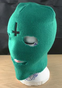 This is a green balaclava as seen in the music video to she and worn on tour by tyler the creator of ofwgkta.  Made from same hat as the original but with a high quality professionally embroidered cross on the forehead designed to look sketchy & hand done like the original but with the permanence of embroidery. Ideal for dress-up or just to get though the up coming cold winter with a little SWAG This is not an official Odd Future product. It was made by myself. Item sent within 3 working days of Casual Balaclava Beanie For Streetwear, Casual Streetwear Balaclava, Green Full Face Balaclava For Outdoor Use, Green Balaclava For Winter Cold Weather, Green Casual Balaclava For Winter, Green Full Face Balaclava For Outdoor, Fitted Casual Balaclava For Fall, Full Face Green Balaclava For Outdoor, Casual Green Balaclava For Winter