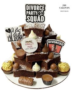 a cake that has some kind of dessert on top of it with stickers and candies