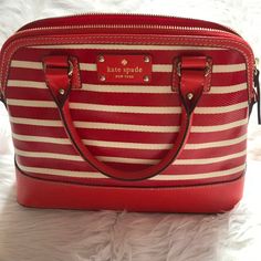 Adorable Red And White Striped Bag. All Metal Detailing Is Gold. Includes A Detachable And Adjustable Red Strap And A Matching Wallet. Never Worn And In Excellent Condition. Kate Spade Red Rectangular Shoulder Bag, Kate Spade Red Satchel Bag, Kate Spade Red Bags For Daily Use, White Kate Spade Bag With Zipper Closure, Kate Spade Red Travel Bag, Kate Spade Red Crossbody Shoulder Bag, Kate Spade Red Shoulder Bag For Everyday, Red Kate Spade Shoulder Bag For Everyday, Red Kate Spade Bag For Shopping