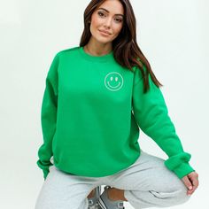 Looking for a cute versatile top to wear? Make sure to grab one of our Graphic Sweatshirts! This soft and comfortable shirt is the perfect top for any outfit. It can be paired with biker shorts, Jeans, or the classic stay at home sweats! This sweatshirt is true-to-size, so be sure to order your regular size! If you are looking for a more oversized look, make sure to size up. Cute Winter Tops For Everyday Wear, Green Cotton Crew Top, Green Cotton Crew Neck Top, Cute Long Sleeve Tops For Everyday, Green Crew Neck Tops With Letter Print, Casual Green Crew Sweatshirt, Casual Green Crew Neck Sweatshirt, Green Crew Neck Top For Fall, Trendy Green Crew Neck Top