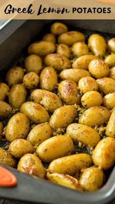 a pan filled with potatoes sitting on top of a table