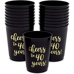 black and gold cups with cheers to 40 years written on them