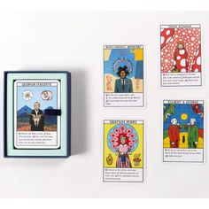 four cards in a box with pictures on them