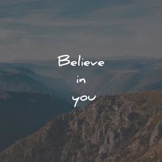 the words believe in you are written on top of a mountain with mountains in the background