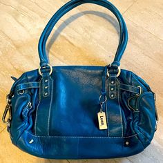 Nwot Feels Like Leather Blue Hobo Shoulder Bag With Top Carry Handle, Blue Shoulder Bag With Handle Drop, Blue Hobo Bag With Handle Drop For Everyday Use, Blue Hobo Bag For Errands, Blue Hobo Bag With Top Carry Handle, Blue Hobo Tote Bag With Top Carry Handle, Everyday Blue Satchel With Handle Drop, Everyday Blue Satchel, Blue Everyday Shoulder Bag With Handle Drop