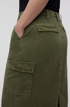 The traditionally rugged cargo aesthetic gets a refined makeover in this olive-hued midi detailed with plenty of pockets. 32" length (size 29) Zip fly with hook-and-bar closure Front slant pockets; cargo flap-patch pockets 81% cotton, 19% viscose Machine wash, tumble dry Imported Cargo Aesthetic, Cargo Midi Skirt, Cotton Midi Skirt, Closet Essentials, Cargo Skirt, Jeans Rock, Madewell Denim, Skirted Swimwear, High Waist Jeans