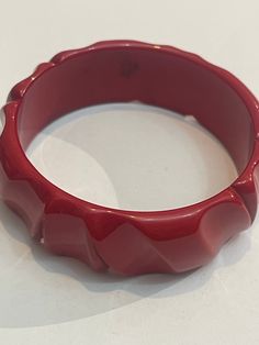 Antique Bakelite bracelet in gorgeous red color with beautiful inlays Elegant Red Bangle Bracelets, Elegant Red Bangle Bracelet, Modern Red Bracelet Jewelry, Adjustable Red Bracelets For Formal Occasions, Vintage Red Adjustable Bangle, Modern Red Bangle Bracelet, Modern Red Bangle Bracelets, Elegant Red Adjustable Bangle, Elegant Red Round Cuff Bracelet