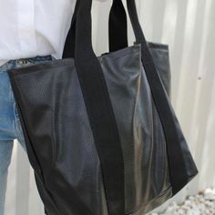 Visiting a friend on a different college campus? Headed to the beach or home for the weekend? The Weekender Tote is the perfect bag option for you. With a zipper at the top and pouch on the inside- you can fit all your necessities in one bag for the weekend. $188 17" tall x 26" wide x 10" deep Bag Hanger, Jewelry Hanger, College Campus, Weekender Tote, One Bag, Stylish Gifts, Perfect Bag, The Weekend, Gym Bag