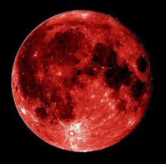 the full moon is shown in red and black