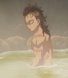 a naked man standing in the water with his eyes wide open and hair blowing back