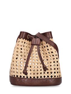 Height: 20cm Width: 22cm Depth: 15cm. Adjustable strap. Drawstring closure. Leather details. Handwoven. Unlined Tory Burch Ella, Chic Leather, Oversized Blouse, Raffia Bag, Woven Rattan, Leather Trims, Calf Leather, Bucket Bag, Scarf Accessory