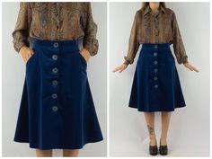 "Vintage velvet skirt - Betty Barclay Made in France 1970s Blue velvet skirt . A line cut. Mid length. 6 big blue front buttons. 2 pockets. Label inside .  In very good condition. 100% cotton Size : 40 The model wears usually a size S (EU 36-38) and measures 170cm - 66,9\".       Measures (taken flat):  Waist: 38cm - 14,9\" Bottom: 78cm - 30,7\" Length: 68cm - 26,7\" Please note that our items are vintage and may have minor imperfections. For more details, product information or additional photos, please do not hesitate to contact us." Blue Velvet Skirt, Wide Skirt, A Line Cut, Cranberry Color, Winter Skirt, Velvet Skirt, Pretty Bags, Vintage Velvet, Big Blue