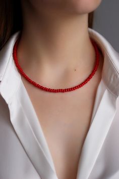 Bright minimalist beaded choker with deep red czech glass beads, strong double nylon thread, silver tone clasps, silver tone lobster clasp and stainless steel adjustable length chain. Perfect for everyday wear or a pretty gift for someone special! You can wearing it with other chokers, chain necklaces or alone! Total length of necklace is 42.5 cm or 16.7 inches and 4.5 cm of adjustable length chain. NOTE: in my store you can also find similar necklaces in other colors as in the last photo. The p Minimalist Red Beaded Necklaces, Minimalist Red Beaded Necklace, Red Minimalist Beaded Necklace With Tiny Beads, Adjustable Red Choker With Tiny Beads, Minimalist Red Beaded Necklace With Tiny Beads, Red Minimalist Beaded Necklace, Adjustable Single Strand Red Beads, Adjustable Red Beaded Necklace With Lobster Clasp, Bright Minimalist