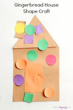 paper plate gingerbread house shape craft with circles and shapes cut out to make it