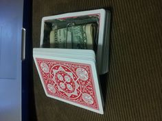 a stack of money sitting inside of a card holder