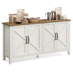 a white buffet with wooden top and doors