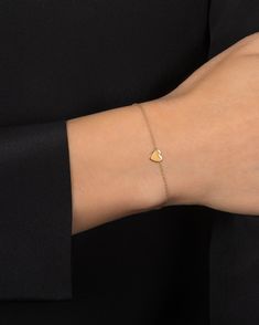 Beautifully handcrafted 14k solid gold heart bracelet, perfect solo or stacked, a fun and timeless everyday bracelet. made in L.A. Size of heart: Approx. 0.5''(H) by 0.5''(W) Comes gift ready in our beautiful branded jewelry box. Modern Heart Charm Jewelry For Everyday, Modern Everyday Jewelry With Heart Charm, Elegant Heart Charm Bracelet For Friendship, Elegant Everyday Heart-shaped Bracelets, Elegant Everyday Heart Bracelets, 14k Gold Bracelet With Heart Charm For Everyday, Adjustable Yellow Gold Minimalist Heart Bracelet, Dainty Everyday Bracelets With Heart Charm, Elegant Double Heart Bracelet For Friendship