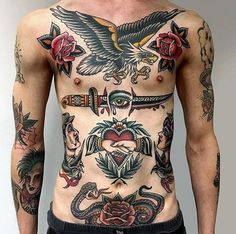 a man with lots of tattoos on his chest