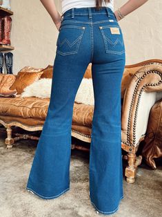 The cutest Wrangler flares & they are perfect for any outfit! Every girl needs these in their closet!! Perfect for work or school & so easy to dress up because they don't have any distressing. Jeans are a true indigo color. The first three pictures have natural light altering the color a little. Color is close to 2nd + 3rd set of photos. 32” Inseam 98% Cotton 2% Elastane Jacie is 5'4", a size 26 & 34B wearing a 26 Kodi is 5'2", a size 26 & 32B wearing a 26 Pressley is 5’4”, a size 25 & extra sma Texas Outfits, Casual Cowgirl, Western Dressage, Distressing Jeans, Vogue Home, Cowgirl Clothes, Pendleton Fabric, Cowgirl Summer, Country Clothes