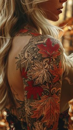 a woman with long blonde hair and tattoos on her back is looking at the camera