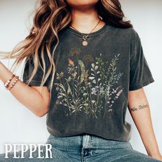 "Boho Floral Cottagecore Shirt Wildflower Garden T shirt Comfort Colors Fall Flowers Nature Tshirt Gift for Flower Garden Lover Spring Tee Comfort Color C1717- Wildflowers t shirt Unisex Garment-Dyed shirt  Main store: https://www.etsy.com/shop/May5thDesign?ref=seller-platform-mcnav Colors are linked to the corresponding photos if u click on the colors on the drop down menu for colors)  *Our shirts are made to order especially for you. Because of this reason, we don't accept returns or exchanges. Unless there's defects. Please check your color and size chart before you place your order.  How to Order: 1.Select the shirt and color size  2.Select the quantity 3.Click \" add to cart \" 4.Complete check out Comfort colors introduces garment-dyed-Tshirt; a fully customizable tee made 100% with Botanical Short Sleeve Cotton Tops, Botanical Style Short Sleeve Cotton Tops, Botanical Short Sleeve Summer Tops, Botanical Style Screen Print Tops For Spring, Botanical Screen Print Tops For Spring, Botanical Cotton Tops With Short Sleeves, Botanical Printed Cotton Top, Relaxed Fit Crew Neck Tops With Plant Print, Botanical Printed Crew Neck Top