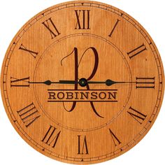 a wooden clock with roman numerals on the face and date for each hour