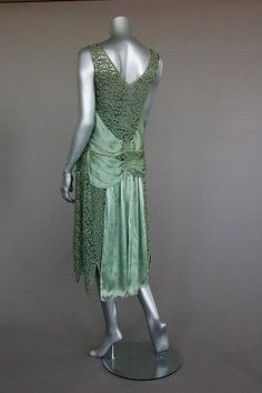 Jeanne Paquin labelled green lace and satin flapper dress from the summer of 1927, with diagonal satin bands converging at the front, two floating panels and integrated satin waist slip. Lace And Satin Dress, 20’s Fashion, Style Année 20, 1920 Dress, 1920 Fashion, That Dress, 20s Fashion, Guy Laroche