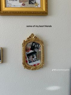 a wall with pictures and magnets on it that says some of my best friends