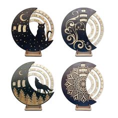 three wooden sculptures depicting the moon and two wolfs