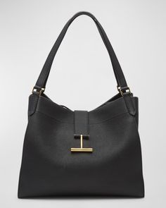 TOM FORD "Tara" tote bag in leather, faux leather (polyurethane), and brass     Flat shoulder straps     Open top with Tstrap magnetic closure     Interior, one zip pocket     Lining: Polyurethane    Approx. 12.2"H x 14.4"W x 7.1"D    Item Weight (Lbs.): 2.1    Made in Italy Tom Ford Brand, Tom Ford Bag, Tom Ford Handbags, Denim Shoulder Bags, Womens Designer Handbags, Closet Organizer, Top Handle Handbags, Luxury Bag, Leather Projects