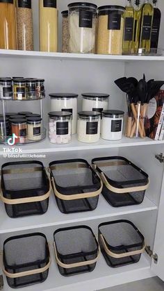 an organized pantry with lots of containers and food items on the shelve shelves